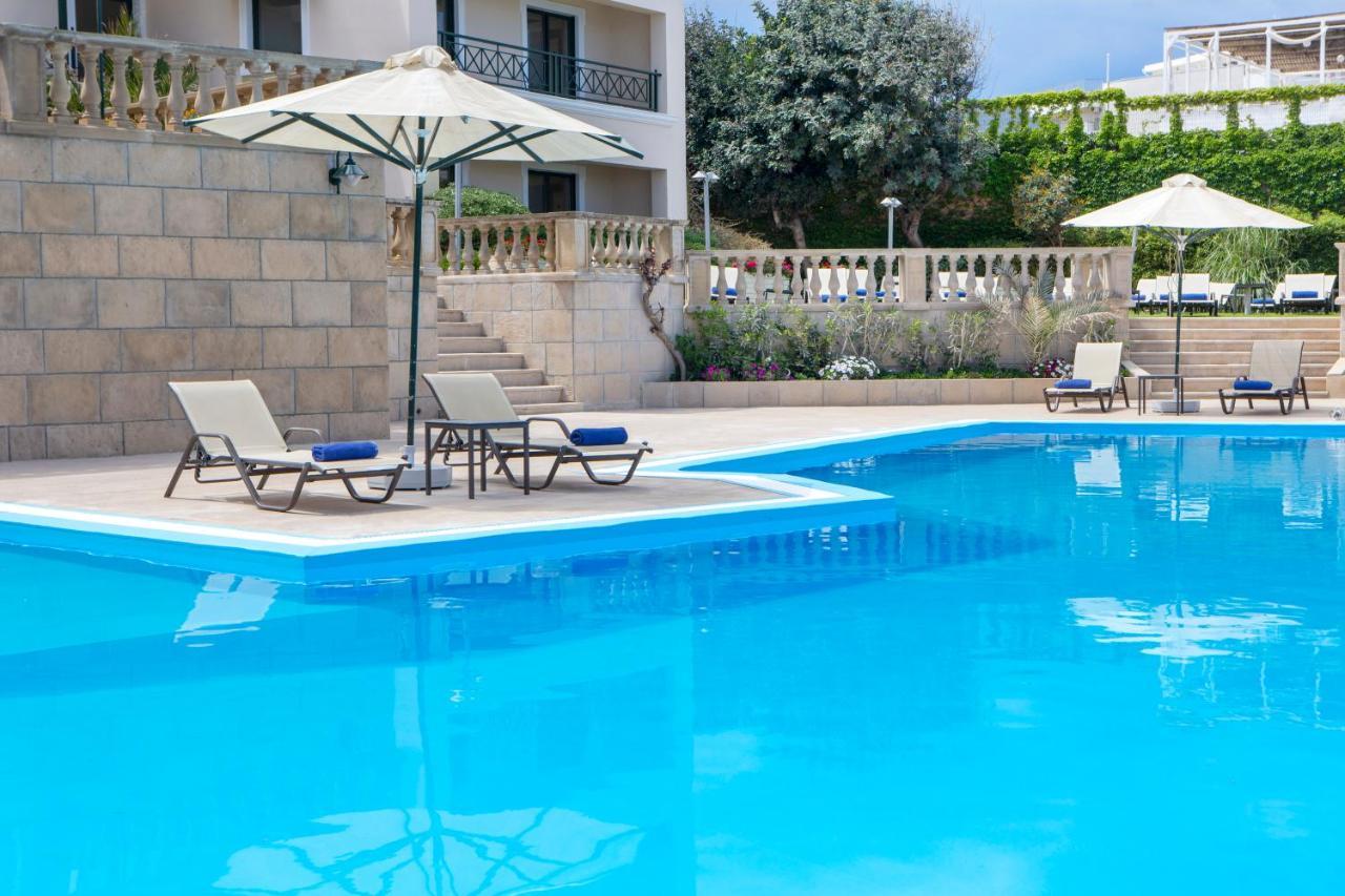 Ramada By Wyndham , Athens Club Attica Riviera Hotel Mati Exterior photo A swimming pool