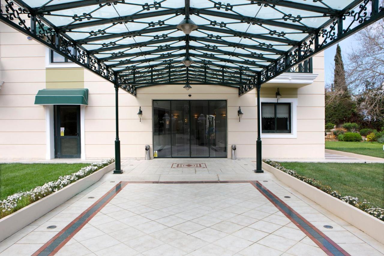Ramada By Wyndham , Athens Club Attica Riviera Hotel Mati Exterior photo Entrance of the hotel