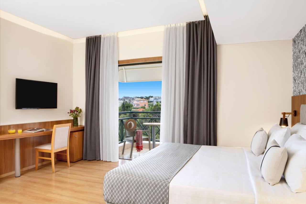 Ramada By Wyndham , Athens Club Attica Riviera Hotel Mati Exterior photo A room at the hotel