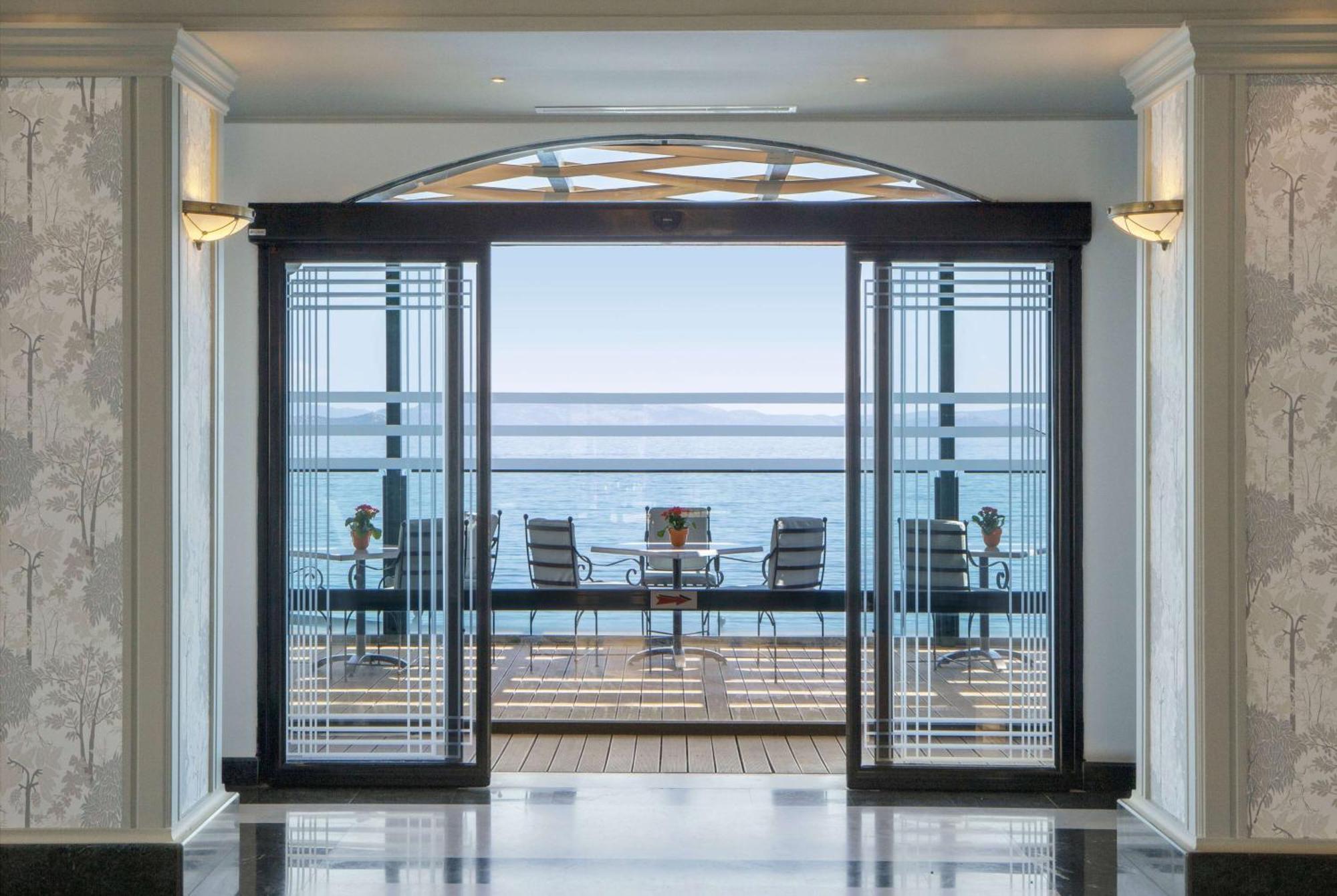 Ramada By Wyndham , Athens Club Attica Riviera Hotel Mati Exterior photo The view from the hotel's lobby