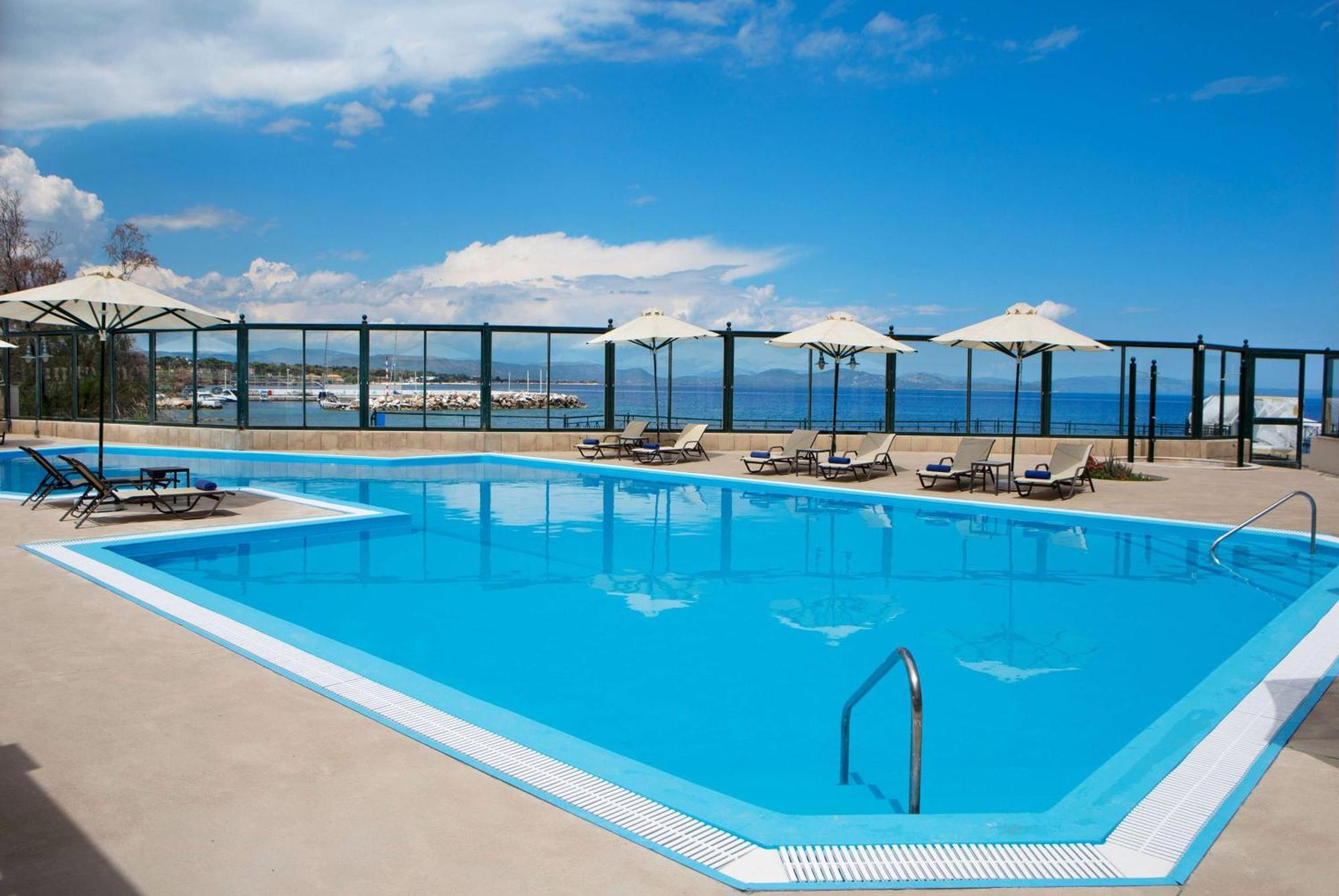 Ramada By Wyndham , Athens Club Attica Riviera Hotel Mati Exterior photo A swimming pool