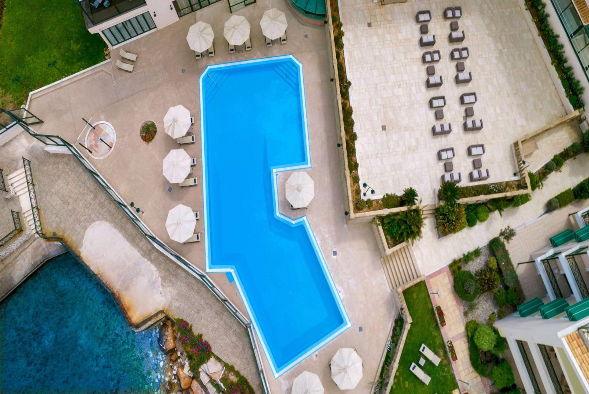 Ramada By Wyndham , Athens Club Attica Riviera Hotel Mati Exterior photo Aerial view of the hotel