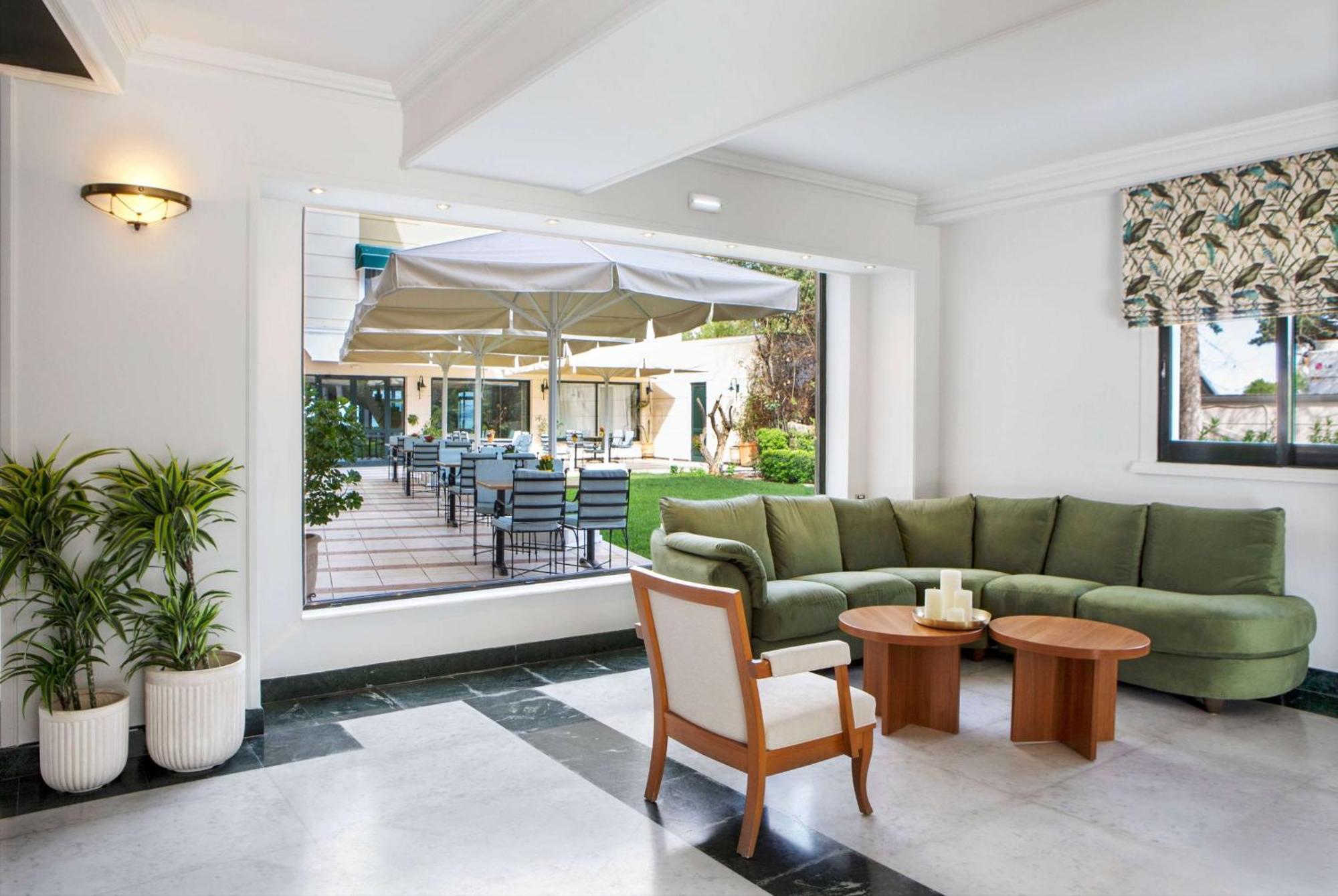 Ramada By Wyndham , Athens Club Attica Riviera Hotel Mati Exterior photo Lobby